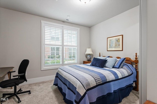 10310 Sablewood Dr Unit 115, Raleigh, NC 27617 - carpeted bedroom featuring baseboards