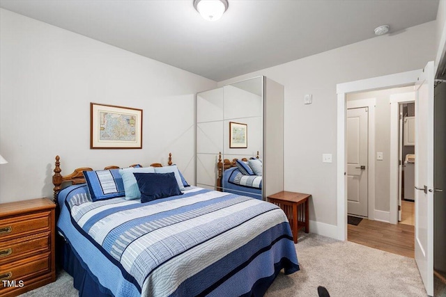 10310 Sablewood Dr Unit 115, Raleigh, NC 27617 - bedroom featuring light carpet and baseboards