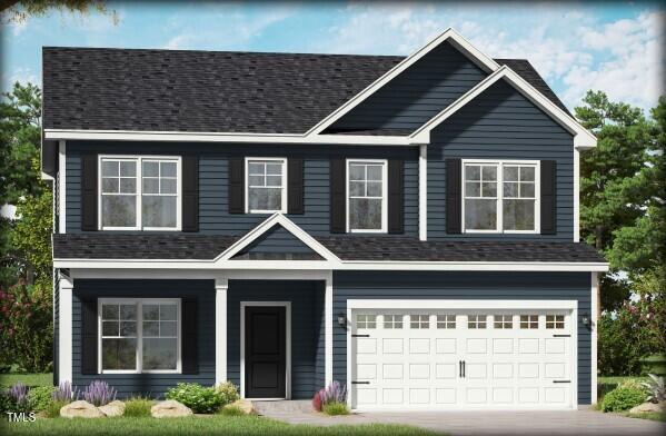 981 Rhum Dr, Fayetteville, NC 28311 - view of front of home with a garage, driveway, a porch, and a shingled roof