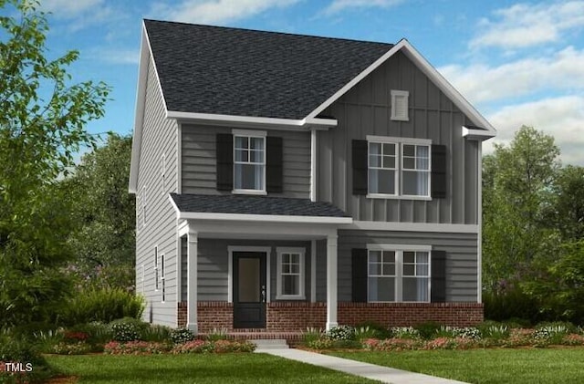 1216 Hardin Hill Ln, Knightdale, NC 27545 - craftsman-style house with brick siding, board and batten siding, a front yard, and a shingled roof