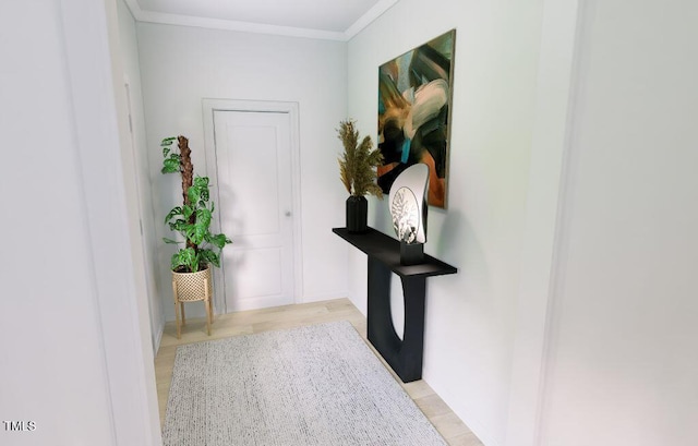 1216 Hardin Hill Ln, Knightdale, NC 27545 - doorway to outside featuring light wood-style flooring and crown molding