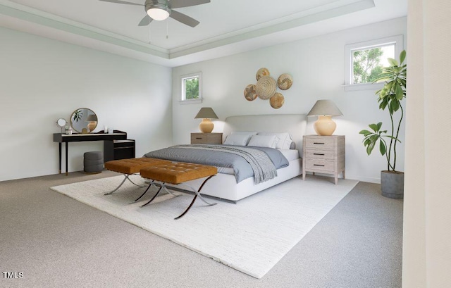 1216 Hardin Hill Ln, Knightdale, NC 27545 - carpeted bedroom with multiple windows, a tray ceiling, and a ceiling fan