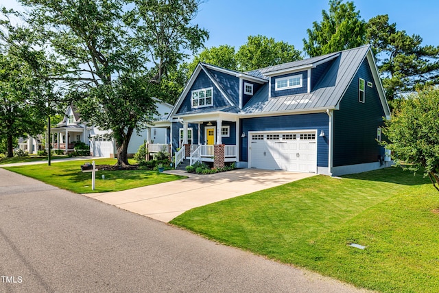 405 Culvert St, Apex, NC 27502 - view of front of house with driveway, a front yard, a metal roof, and a standing seam roof