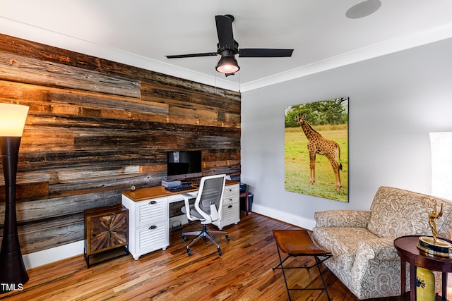 405 Culvert St, Apex, NC 27502 - home office featuring a ceiling fan, wooden walls, and wood finished floors