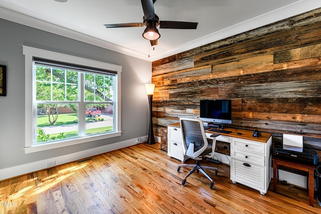 405 Culvert St, Apex, NC 27502 - office area featuring wood walls, ceiling fan, and wood finished floors