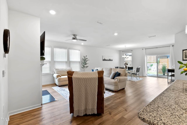 265 Purple Aster St, Youngsville, NC 27596 - living room with wood finished floors, ceiling fan, and recessed lighting