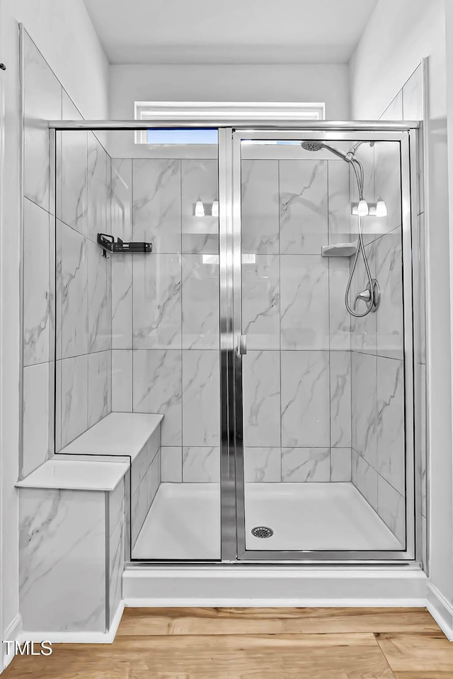 265 Purple Aster St, Youngsville, NC 27596 - full bathroom with a shower stall and wood finished floors