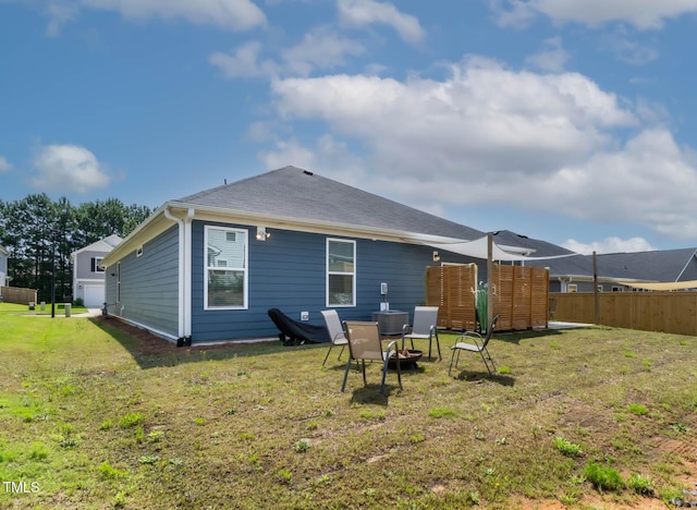 265 Purple Aster St, Youngsville, NC 27596 - rear view of house featuring a shingled roof