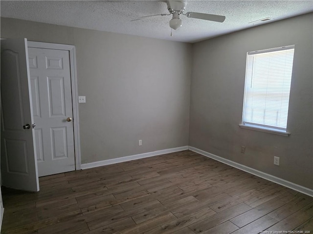 4969 Arlington St, Hope Mills, NC 28348 - empty room featuring ceiling fan, a textured ceiling, and wood finished floors