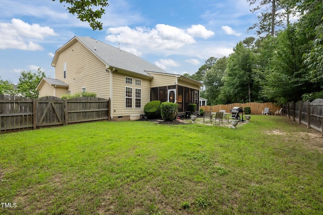 1040 Bellenden Dr, Durham, NC 27713 - rear view of house featuring a sunroom, a fenced backyard, a patio, crawl space, and roof with shingles