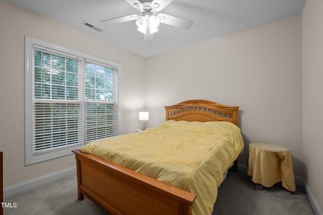 1040 Bellenden Dr, Durham, NC 27713 - carpeted bedroom featuring baseboards and ceiling fan