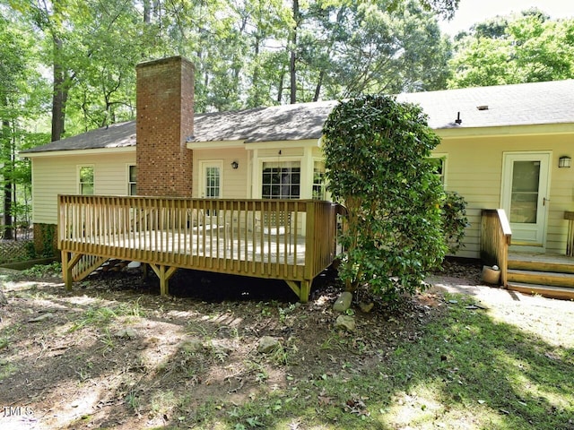 637 Shadywood Ln, Raleigh, NC 27603 - back of property with a chimney and a deck