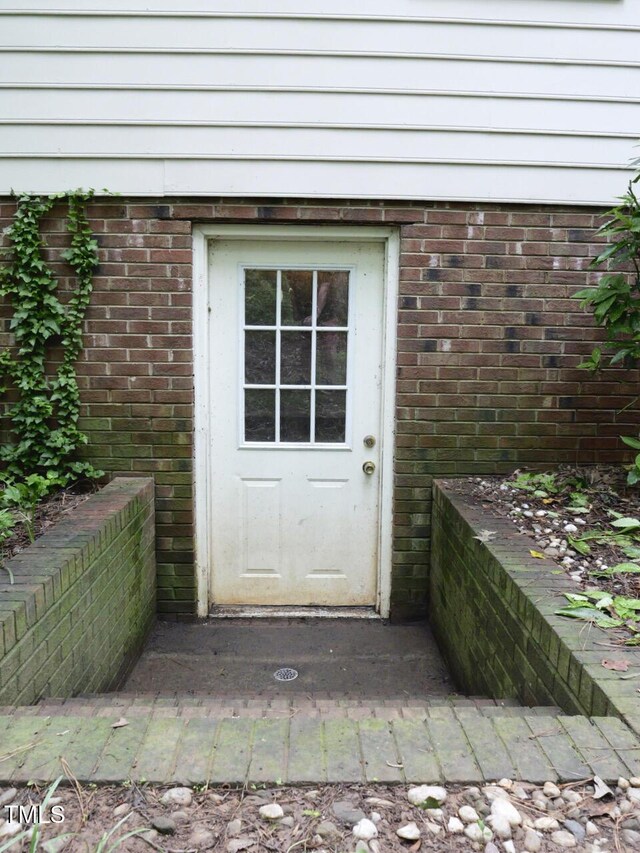 637 Shadywood Ln, Raleigh, NC 27603 - property entrance featuring brick siding