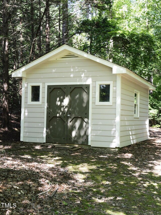 637 Shadywood Ln, Raleigh, NC 27603 - view of shed featuring view of scattered trees