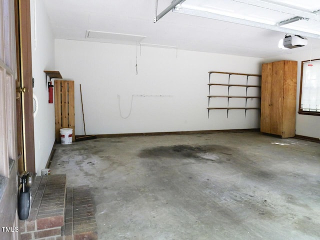 637 Shadywood Ln, Raleigh, NC 27603 - garage featuring a garage door opener