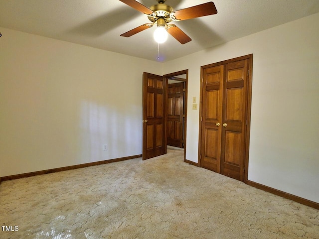 637 Shadywood Ln, Raleigh, NC 27603 - unfurnished bedroom featuring light carpet, a closet, and a ceiling fan