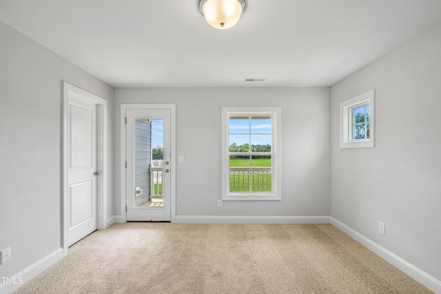 549 Forestville Rd, Wake Forest, NC 27587 - spare room with healthy amount of natural light and carpet flooring