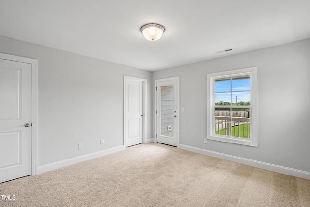549 Forestville Rd, Wake Forest, NC 27587 - unfurnished bedroom featuring carpet floors and baseboards