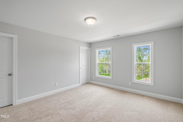 549 Forestville Rd, Wake Forest, NC 27587 - spare room with light colored carpet