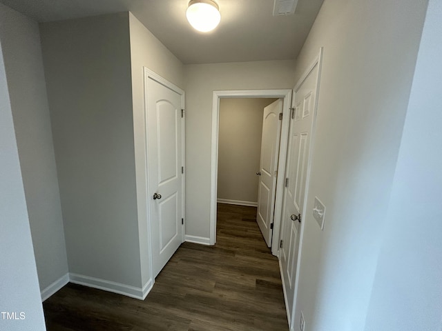 201 W Railroad St, Robersonville, NC 27871 - corridor with dark wood-style floors and baseboards