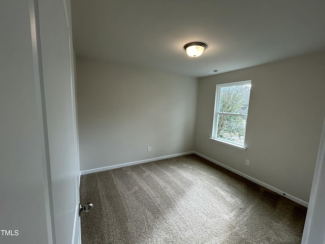 201 W Railroad St, Robersonville, NC 27871 - spare room featuring carpet