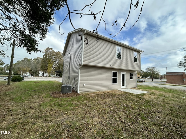 201 W Railroad St, Robersonville, NC 27871 - back of house featuring a yard
