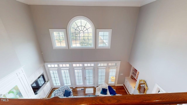 604 Hillcrest Pl, Goldsboro, NC 27534 - living room featuring a towering ceiling, wood finished floors, and crown molding