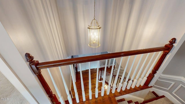 604 Hillcrest Pl, Goldsboro, NC 27534 - stairs featuring a chandelier and carpet floors