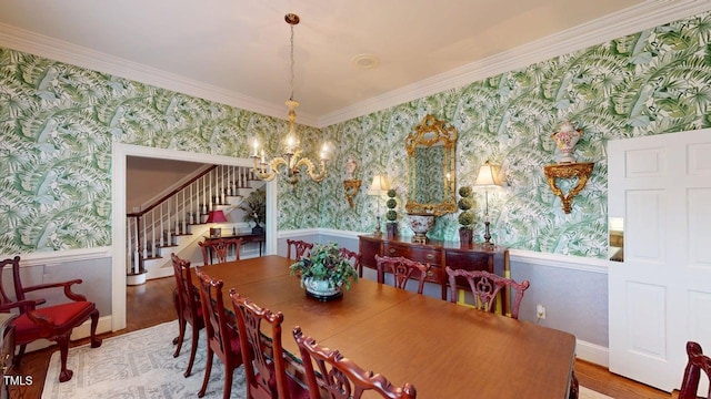 604 Hillcrest Pl, Goldsboro, NC 27534 - dining space featuring wallpapered walls, stairway, a chandelier, wood finished floors, and ornamental molding