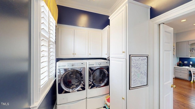 604 Hillcrest Pl, Goldsboro, NC 27534 - laundry area featuring washer and dryer, crown molding, cabinet space, recessed lighting, and wood finished floors
