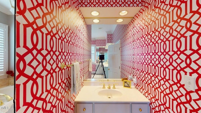 604 Hillcrest Pl, Goldsboro, NC 27534 - bathroom featuring wallpapered walls, vanity, and a tub