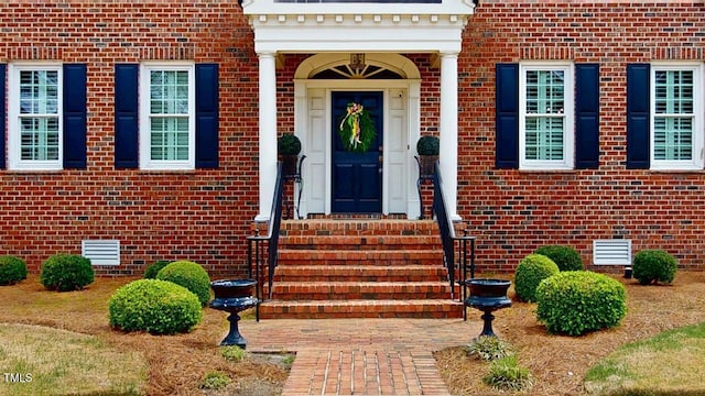 604 Hillcrest Pl, Goldsboro, NC 27534 - property entrance with brick siding and crawl space
