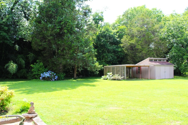 2071 Meadow Ln, Graham, NC 27253 - view of green lawn featuring an outbuilding
