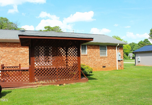 2071 Meadow Ln, Graham, NC 27253 - back of property with brick siding, a lawn, crawl space, and roof with shingles