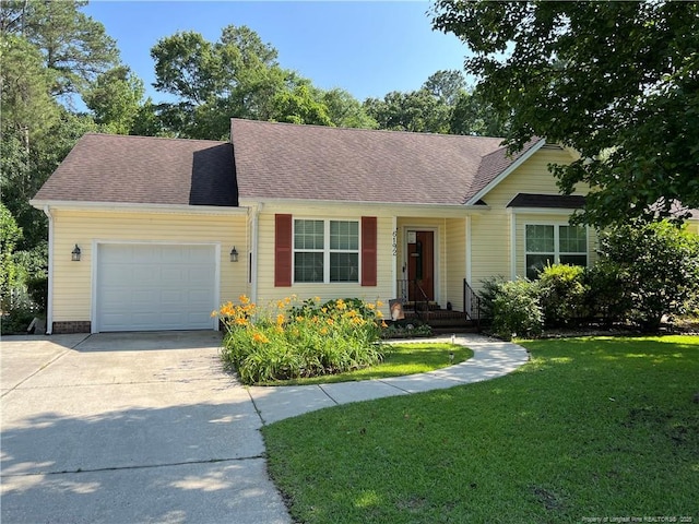 6192 Lakeway Dr, Fayetteville, NC 28306 - view of front facade with a garage, concrete driveway, a front lawn, and roof with shingles