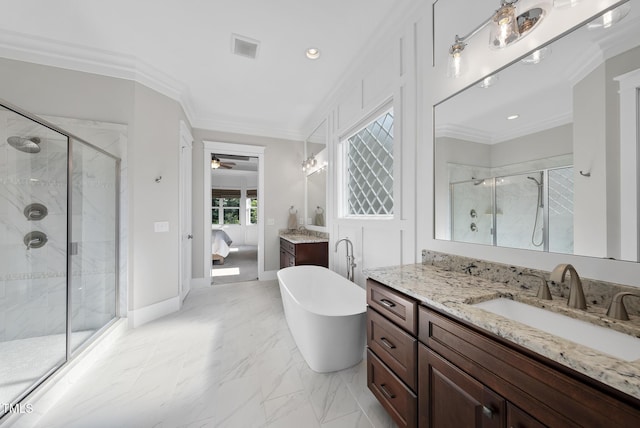 1325 Mackinaw Dr, Wake Forest, NC 27587 - full bath featuring connected bathroom, a shower stall, crown molding, two vanities, and a freestanding bath