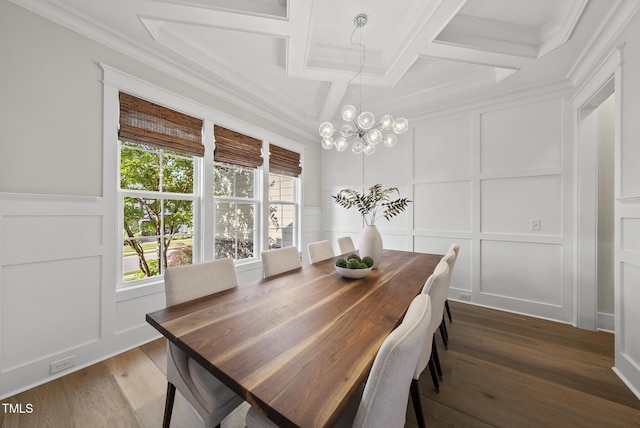 1325 Mackinaw Dr, Wake Forest, NC 27587 - dining area with a decorative wall, coffered ceiling, ornamental molding, a chandelier, and wood finished floors
