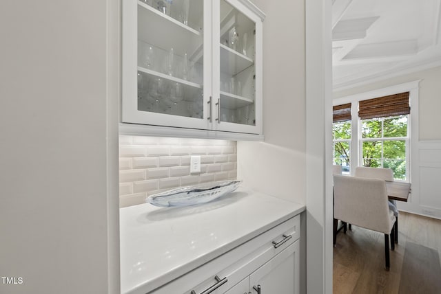 1325 Mackinaw Dr, Wake Forest, NC 27587 - bar area with wood finished floors and tasteful backsplash