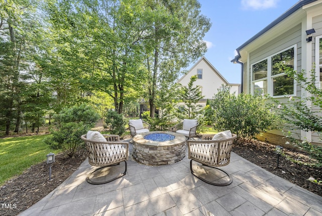 1325 Mackinaw Dr, Wake Forest, NC 27587 - view of patio featuring an outdoor fire pit