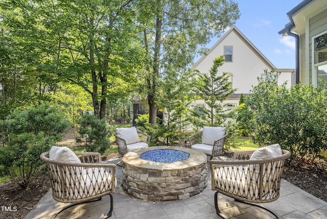 1325 Mackinaw Dr, Wake Forest, NC 27587 - view of patio / terrace with an outdoor fire pit
