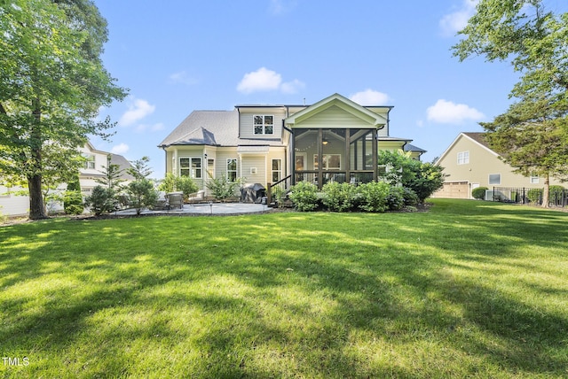 1325 Mackinaw Dr, Wake Forest, NC 27587 - back of house featuring a patio and a sunroom