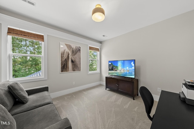 1325 Mackinaw Dr, Wake Forest, NC 27587 - living room with light colored carpet and an office area