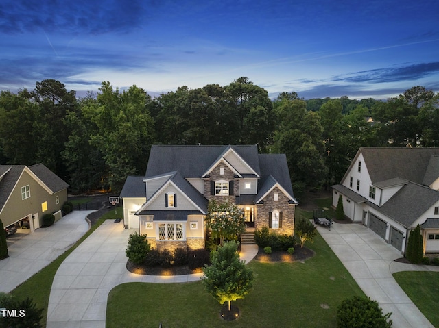 1325 Mackinaw Dr, Wake Forest, NC 27587 - craftsman inspired home with driveway, stone siding, and a front lawn