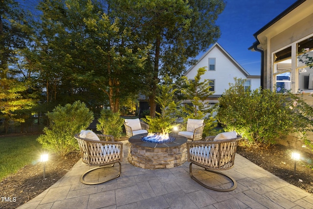 1325 Mackinaw Dr, Wake Forest, NC 27587 - view of patio featuring an outdoor fire pit