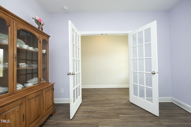 200 Sweet Violet Dr, Youngsville, NC 27596 - corridor featuring french doors and dark wood-style flooring