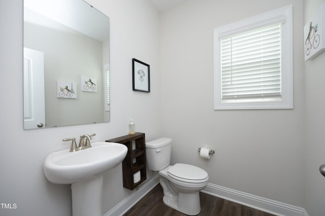 200 Sweet Violet Dr, Youngsville, NC 27596 - half bathroom featuring wood finished floors and toilet