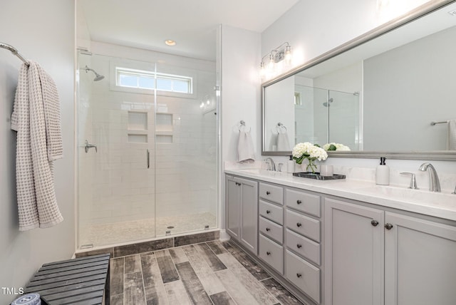 1020 Regency Cottage Pl, Cary, NC 27518 - full bath featuring double vanity, a shower stall, wood finished floors, and recessed lighting
