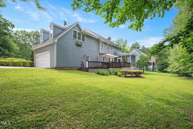 2008 Corberrie Ln, Raleigh, NC 27613 - back of house featuring a wooden deck, a chimney, an attached garage, and a yard