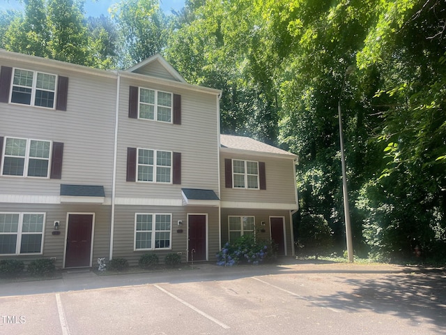 71 Red Ln, Raleigh, NC 27606 - townhome / multi-family property featuring uncovered parking
