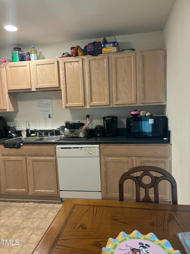 71 Red Ln, Raleigh, NC 27606 - kitchen featuring dishwasher, black microwave, and light brown cabinetry